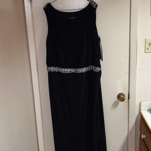 Cache sleeveless black dress with gemstones on both sleeves. And  waist band.